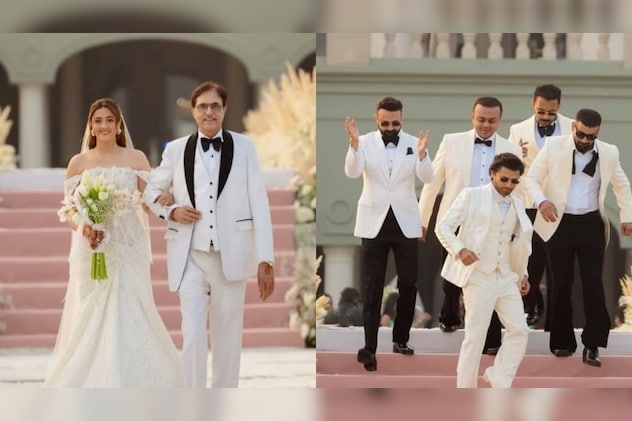 व्हाइट क्रिश्चियन ब्राइडल गाउन  में नूपुर और व्हाइट टक्सीडो  स्टेबिन 