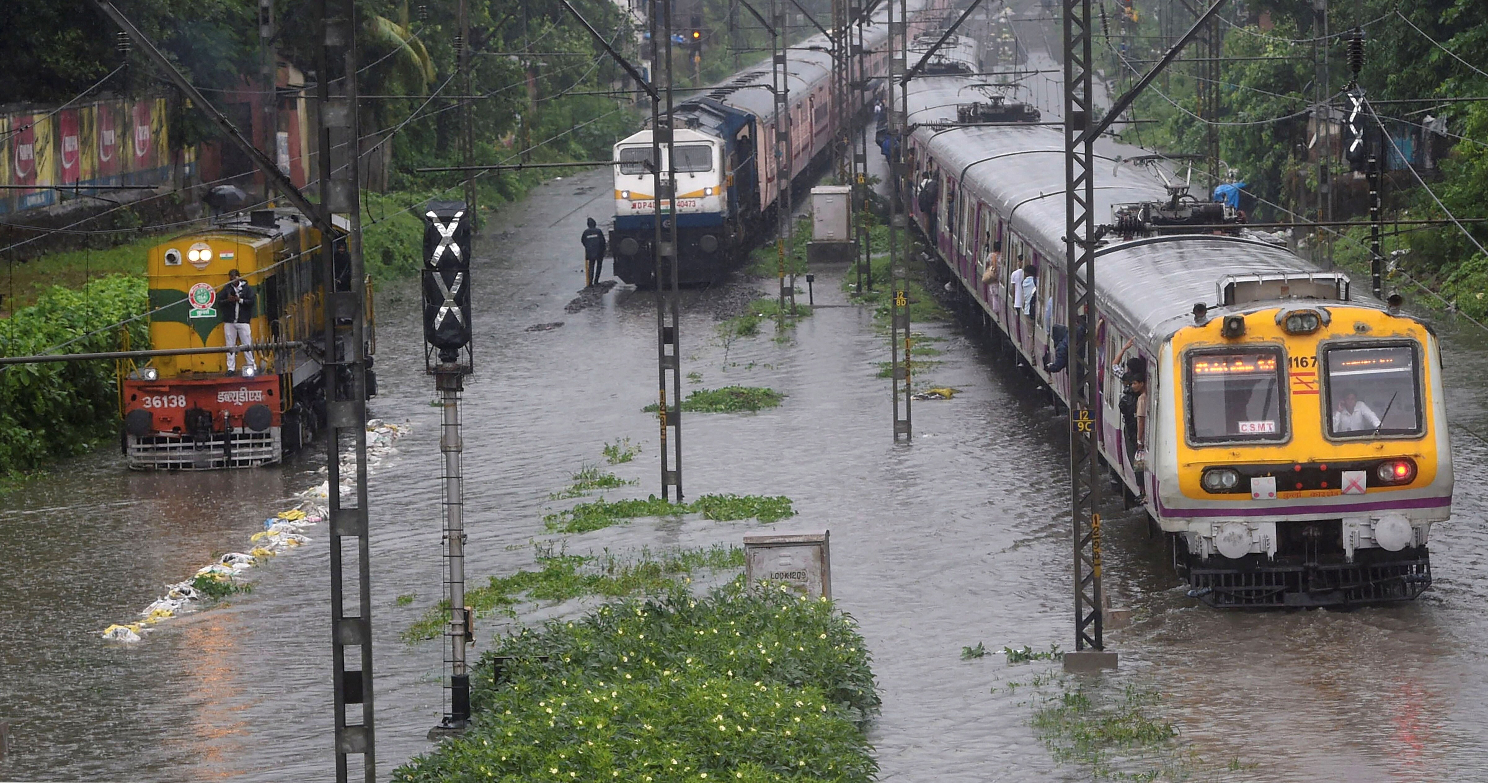 Mumbai Rains Live: Heavy Rains Return To Mumbai; Rail, Road Traffic Hit
