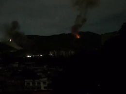 Videos Show Buildings On Fire, Huge Smoke After Blasts In Venezuela