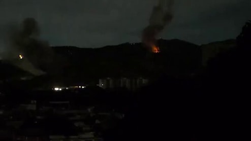 Videos Show Buildings On Fire, Huge Smoke After Blasts In Venezuela