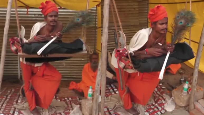 <i>Sadhu</i> Claiming To Be Standing For 7 Years Draws Attention At Magh Mela