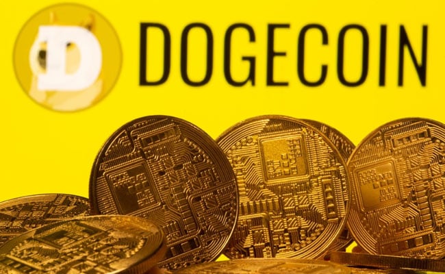 Dogecoin Cryptocurrency Slumps After Hashtag-Fueled Surge To Record High