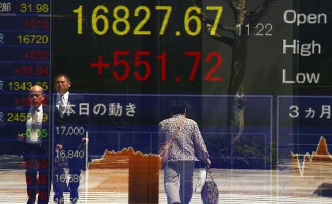 Tokyo Stocks Open Lower, Toshiba Plunges
