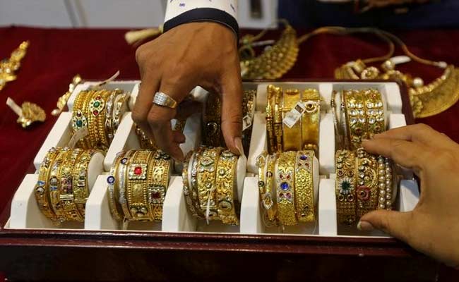 Gold, Silver Slide On Global Worries, Muted Demand