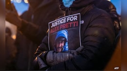 Frigid Quiet, Outraged Sorrow On Minneapolis Street Where Agents Killed Man