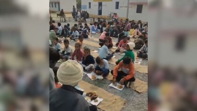 Madhya Pradesh Government School Students Served Republic Day Meal On Torn Book Pages