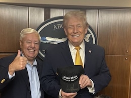 'Make Iran Great Again': Trump Signs Hat As US Vows To Save Iran Protesters