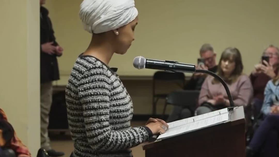 Ilhan Omar Sprayed With Unknown Substance During Minneapolis Town Hall Attack | Watch Video
