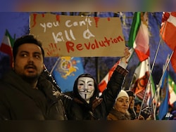 Confronting Protests, Iran Vows To Strike Back If US Attacks