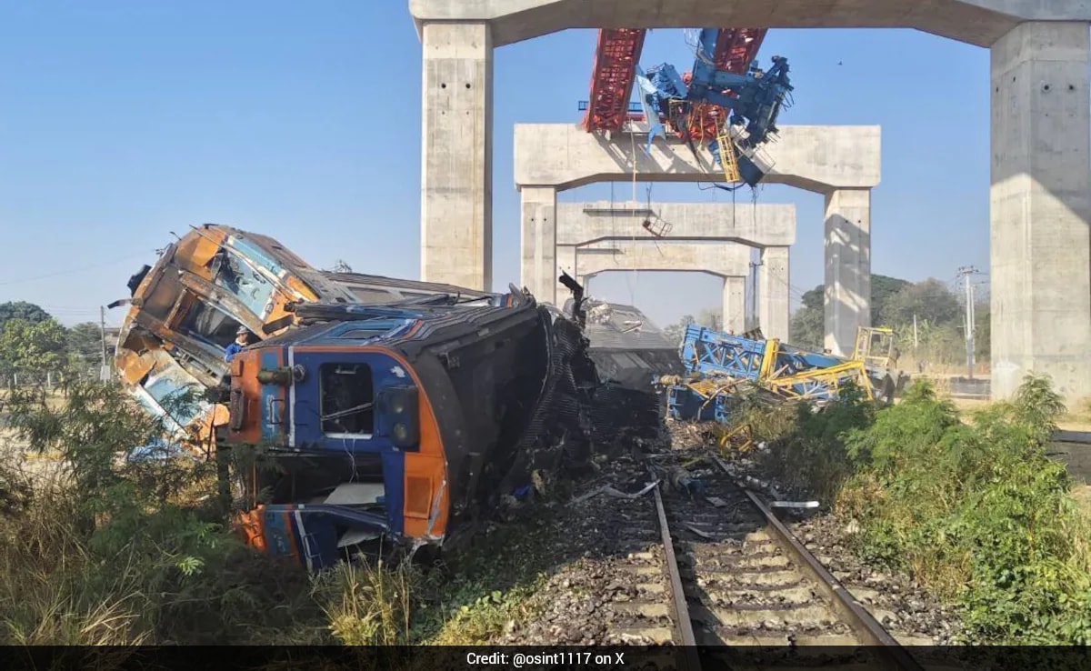 A train travelling from Thailand's capital, Bangkok, to the country's northeast was derailed after a construction crane fell on top of one of its carriages, killing at least 22 people and injuring at least 30, police said.