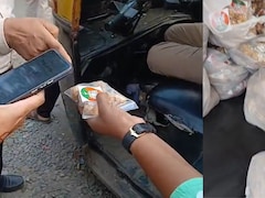 BJP के स्टीकर वाले तिल के लड्डू बांटने पर बवाल, उद्धव सेना ने रुकवाया रिक्शा, चुनाव आयोग तक पहुंचा मामला