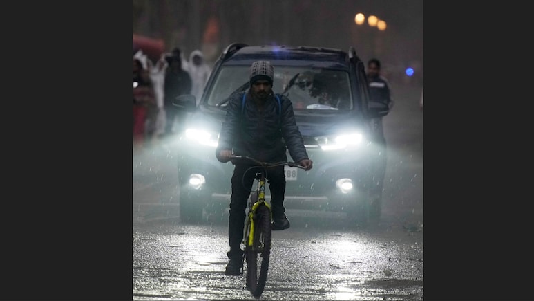 Cloudy Conditions Prevail In Delhi As Light Rain And Thunderstorms Continue