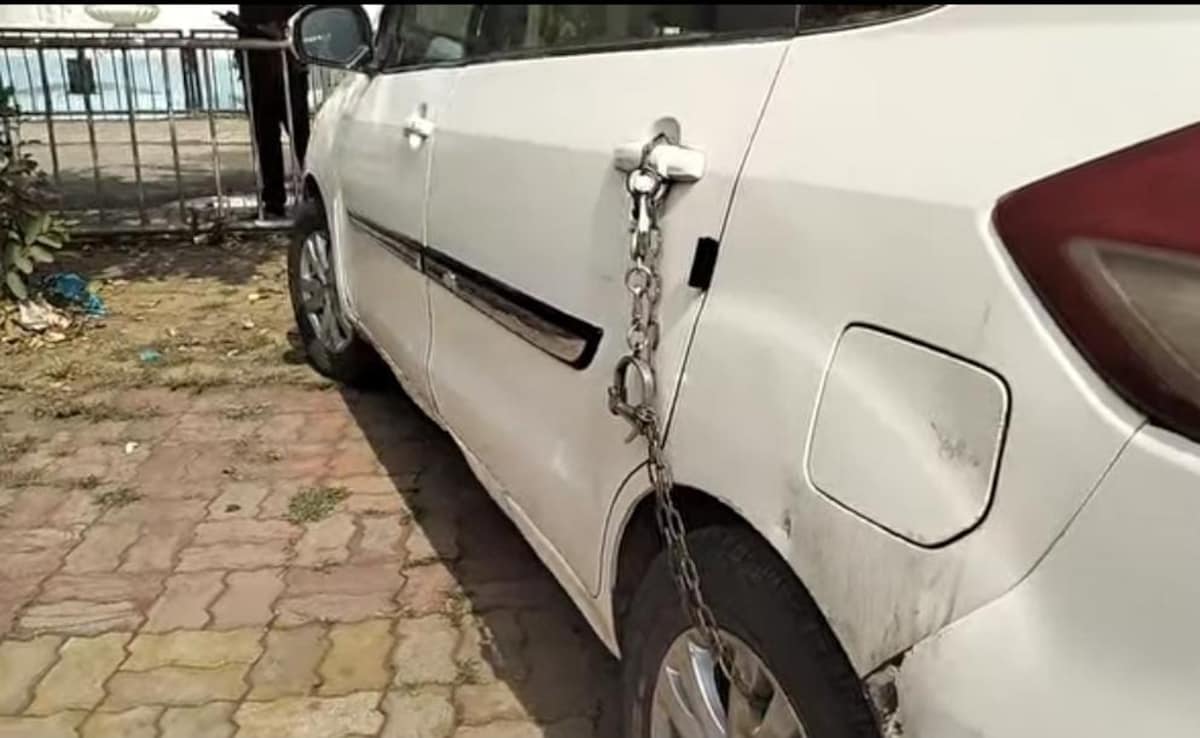 At Madhya Pradesh Police Station, A Car In Handcuffs