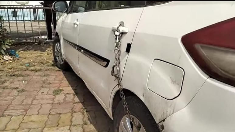 At Madhya Pradesh Police Station, A Car In Handcuffs