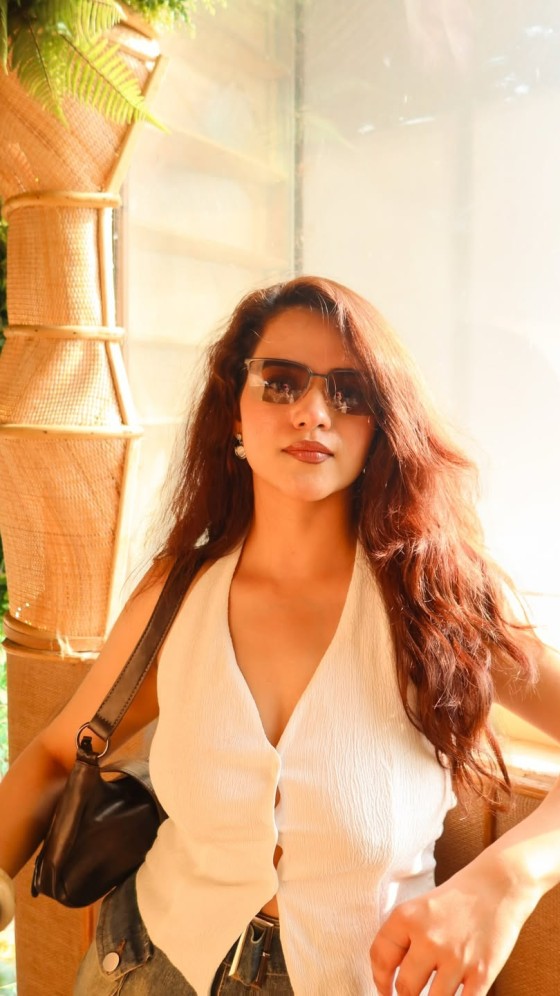 Aashi Sahni Stuns in a Chic White Top and Denim Skirt