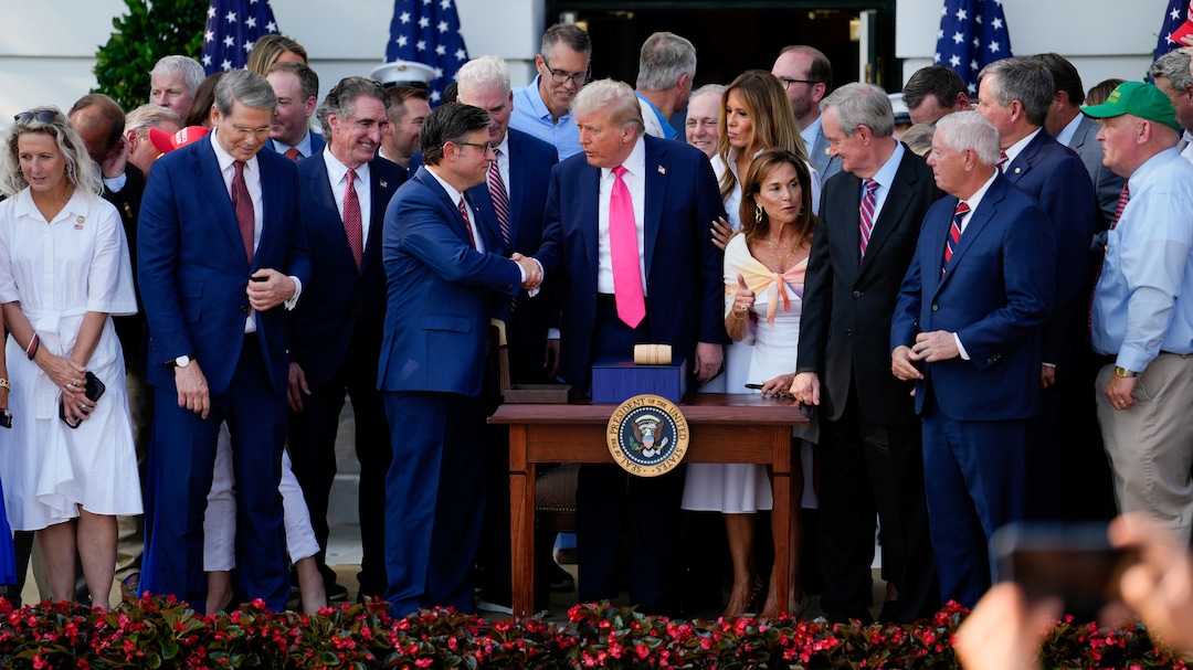 President Donald Trump, center, and House Speaker Mike Johnson, center left, shake hands after signing the One Big Beautiful Bill Act on July 4. President Donald Trump, center, and House Speaker Mike Johnson, center left, shake hands after signing the One Big Beautiful Bill Act on July 4.