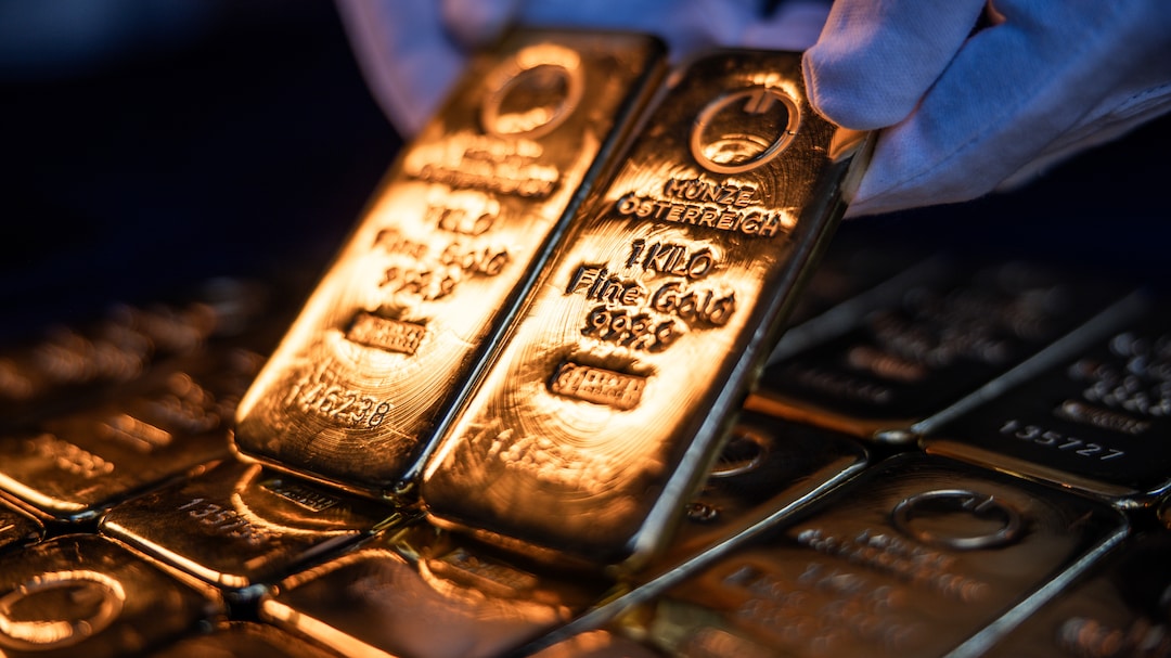 Gold Rises Toward $5,000 As Weaker Dollar Adds Impetus To Rally
