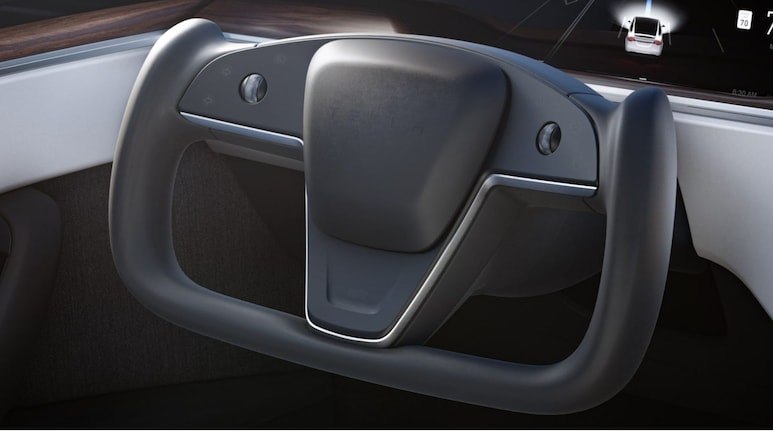 China To Ban Half-Steering Wheel After Flush-Door Handles