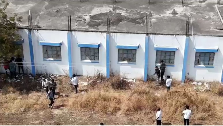 Caught On Drone Cam: Parents Pass Chits To Students During Exam In Maharashtra