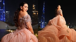 Karisma Kapoor Brings <i>Bridgerton</i> Glamour To Dubai In A Peach Gown