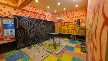 Corporate Burnout? Smash A Bottle About It &mdash; How Gen Z Is Busting Stress In Rage Rooms