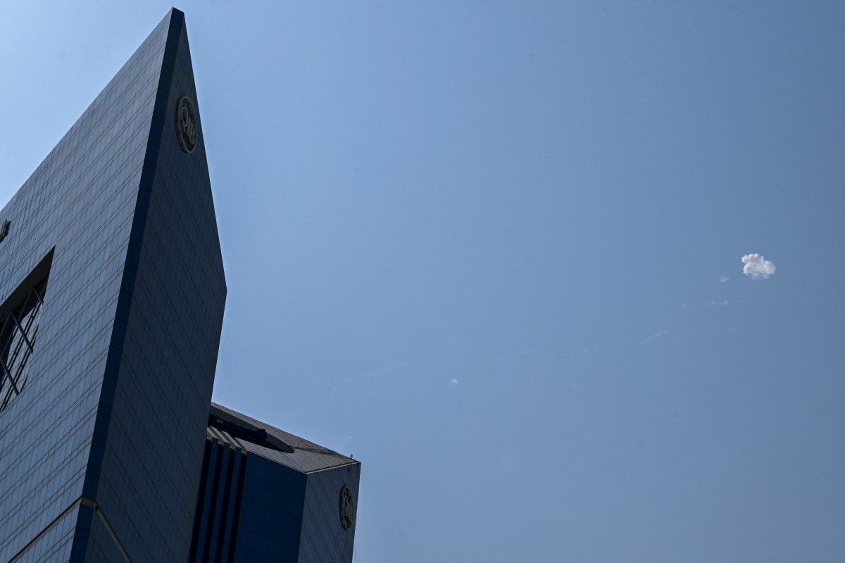 Smoke from a reported rocket interception is seen over the sky in Doha on February 28, 2026.