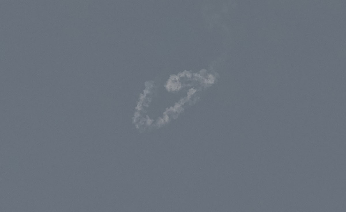 Smoke from a reported rocket interception is seen over the sky in Dubai