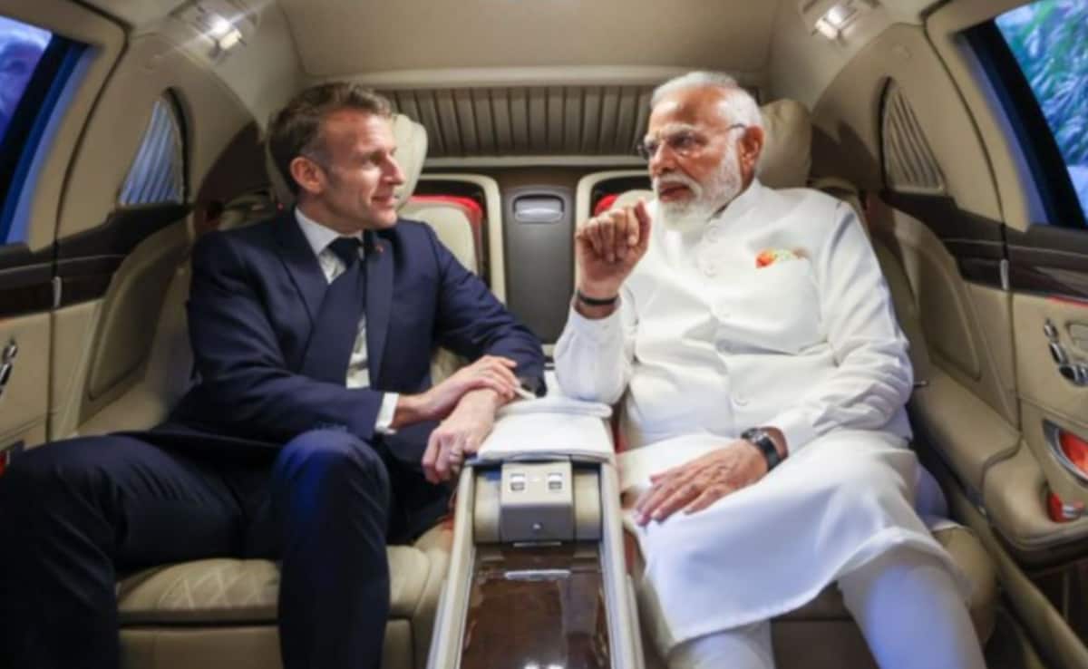 PM Modi Shares Car Ride With French President Macron In Mumbai