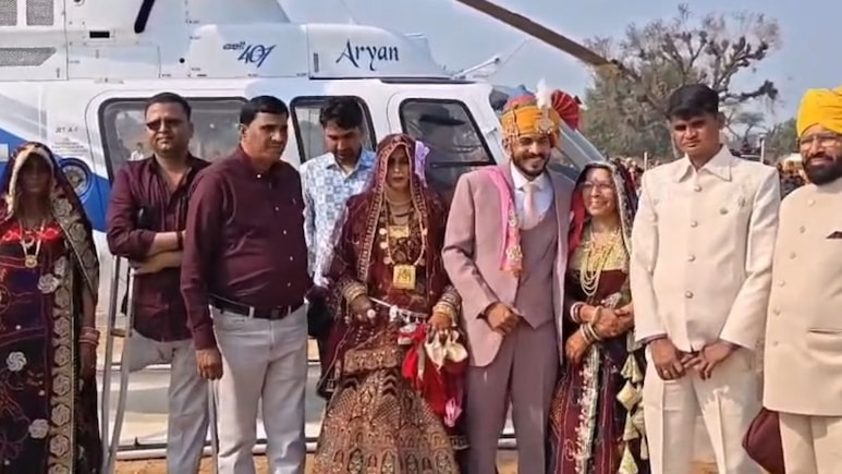 Rajasthan: झुंझुनूं के छावसरी गांव की बेटी पूजा हेलीकॉप्टर से हुई विदा, उड़न खटोले पर सवार होकर आसमान से पहुंची ससुराल