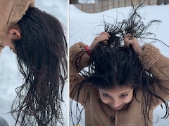 बालों में तेल लगाकर बाहर बर्फ के पास आई बच्ची, फिर जो हुआ वो देख ठिठुर गए लोग, देखें VIDEO