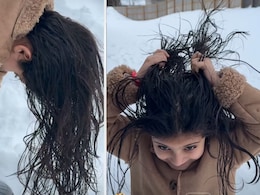 बालों में तेल लगाकर बाहर बर्फ के पास आई बच्ची, फिर जो हुआ वो देख ठिठुर गए लोग, देखें VIDEO