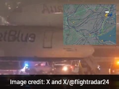 Passengers Evacuate JetBlue Plane After Emergency Landing At Newark Airport