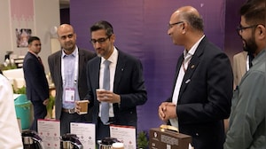 Google Chief Sundar Pichai's Viral Coffee Moment at AI Summit
