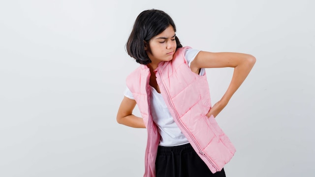 Children's back pain is rising due to heavy bags, poor posture, screen time, and low activity.