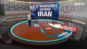 US Warships Ring Iran as Cruise Missiles Fly Into Tehran