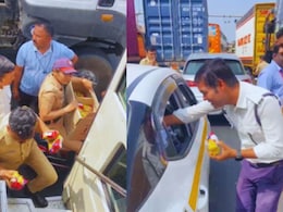 Mumbai&ndash;Pune Expressway : खाकी वर्दीतील माणुसकी....! लोणावळ्यात वाहतूक कोंडीत अडकलेल्या प्रवाशांना पोलिसांचा मदतीचा हात, Video Viral