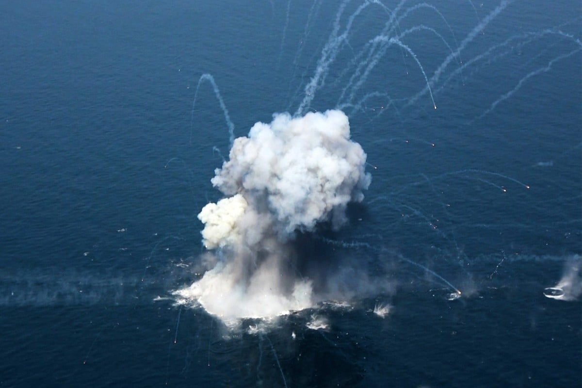 An explosion during a military exercise by members of the IRGC and navy in the Strait of Hormuz