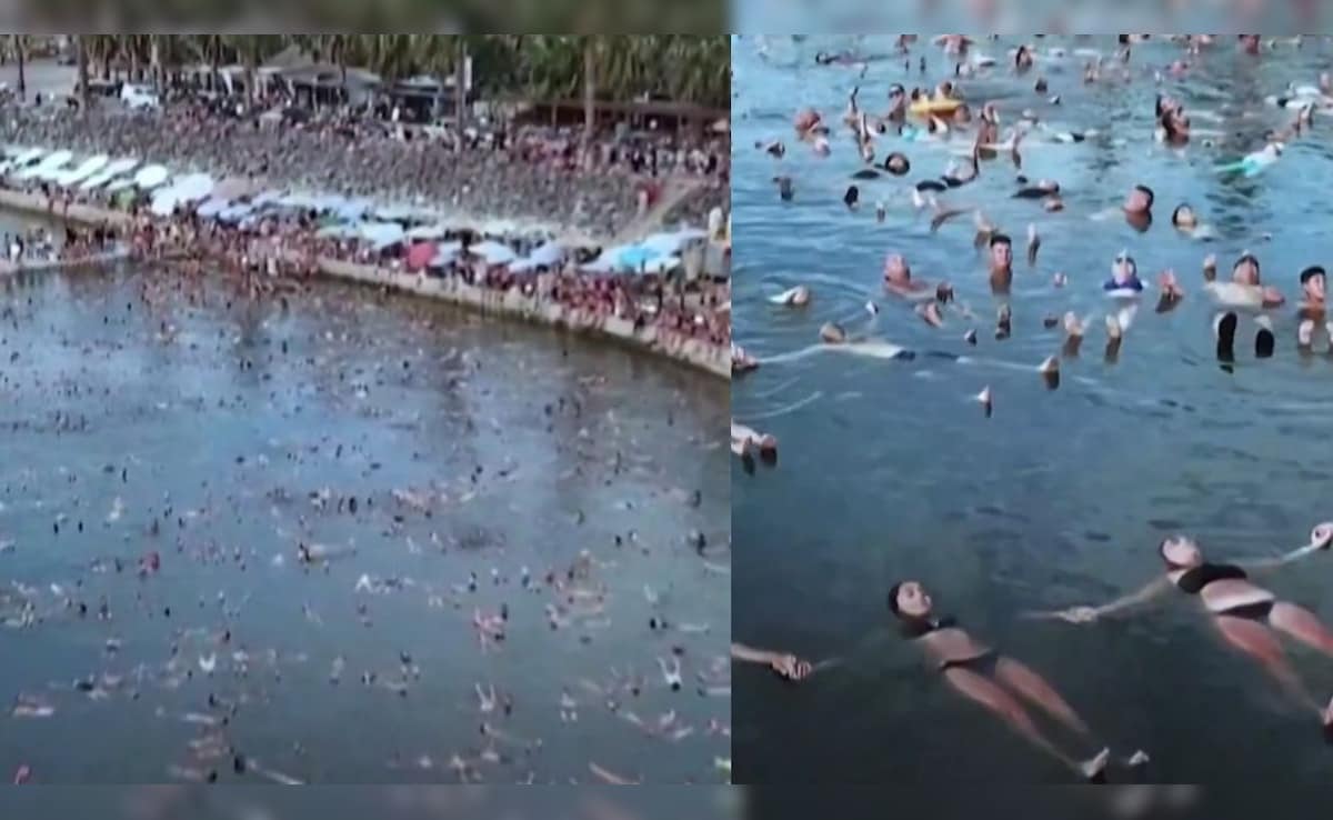 झील के खारे पानी पर आखिर एक साथ क्यों तैरते दिखे 1,837 लोग? चौंका देगी वजह