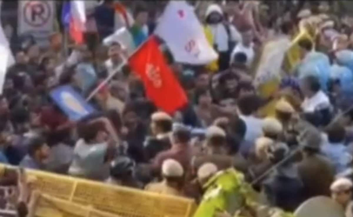 A student seen slapping a police officer 