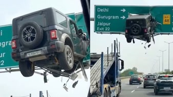 NH-48 पर साइन बोर्ड में घुसी थार! AI या हकीकत? जानिए Viral Video का सच