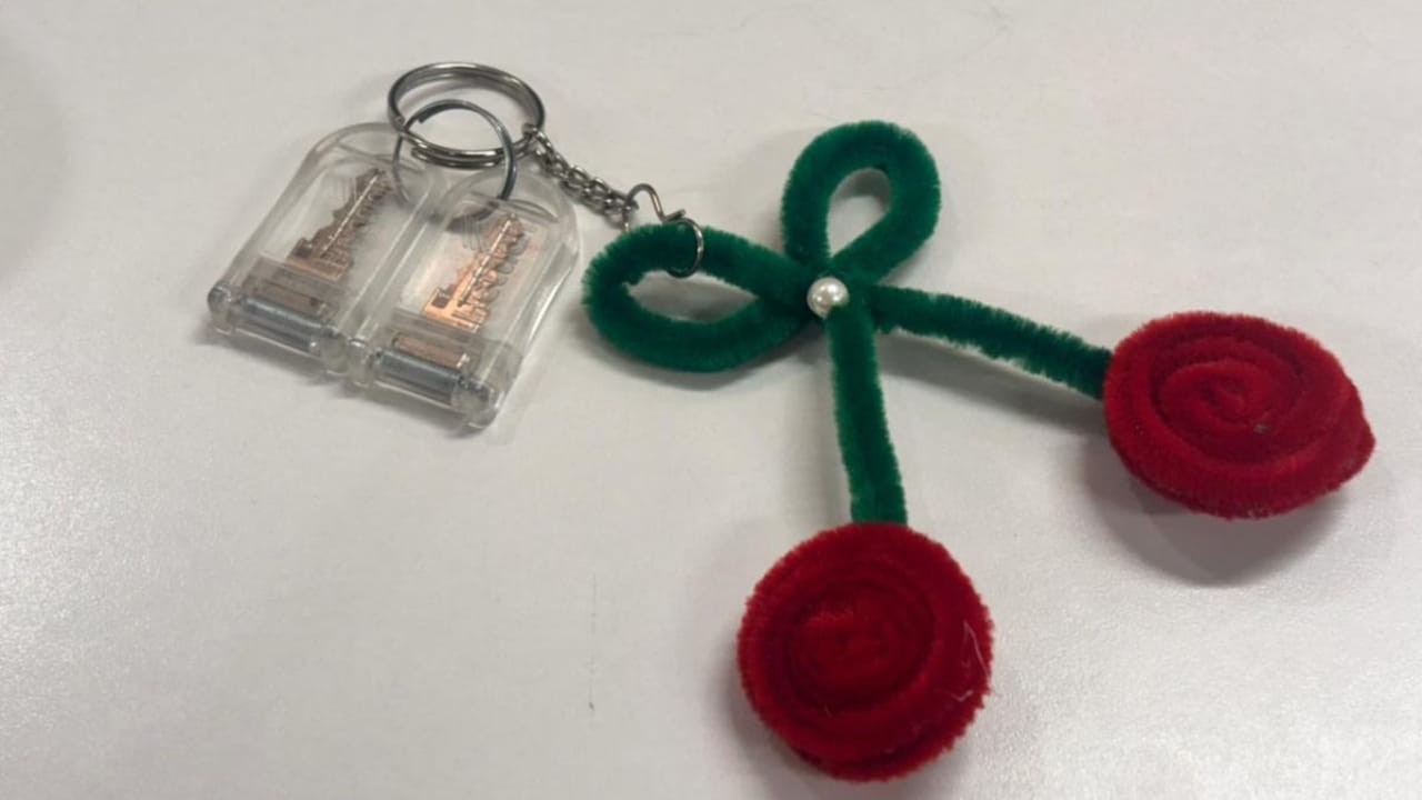 The cherry keychain I bought from the fair is cute and sturdy The cherry keychain I bought from the fair is cute and sturdy