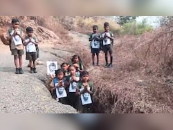 Video: Andhra Tribal Students Sit In Potholes In Unique Protest For Road To School