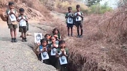 Video: Andhra Tribal Students Sit In Potholes In Unique Protest For Road To School