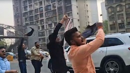 BJP Workers Wave Black Flags At Rahul Gandhi After Congress' Shirtless Protests