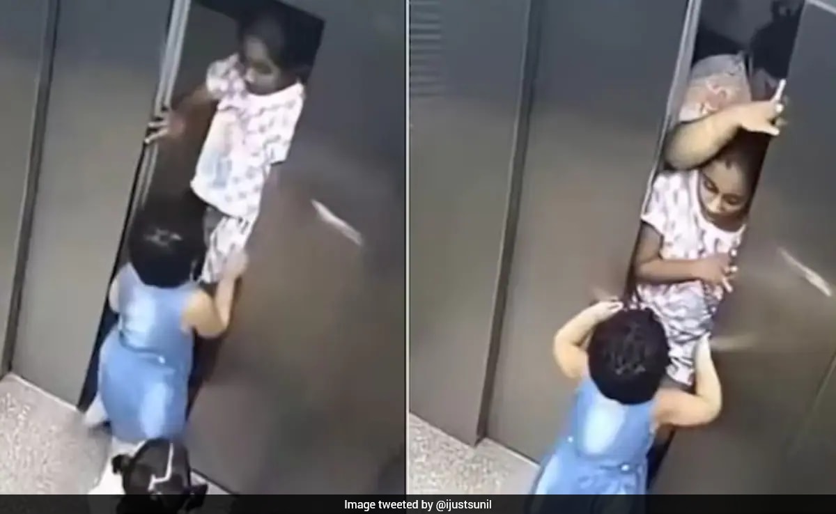 Heart-Stopping CCTV Shows Girl Blocking Closing Lift Doors To Rescue Toddlers