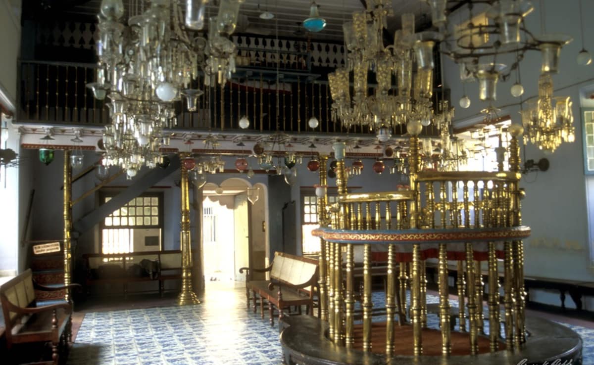The Jewish Synagogue, one of the oldest in the Asian region, was built in 1568 CE. Located at Mattancherry, the synagogue still has the scrolls of the Old Testament and copper plates which record the grants of privilege bequeathed by the Hindu rulers of Kochi. It was rebuilt by the Dutch after having been partially destroyed in the war of 1662 CE. The exquisite hand-painted blue Chinese tiles reveal the cultural interactions which took place in Kerala. The Jewish Synagogue, one of the oldest in the Asian region, was built in 1568 CE. Located at Mattancherry, the synagogue still has the scrolls of the Old Testament and copper plates which record the grants of privilege bequeathed by the Hindu rulers of Kochi. It was rebuilt by the Dutch after having been partially destroyed in the war of 1662 CE. The exquisite hand-painted blue Chinese tiles reveal the cultural interactions which took place in Kerala.