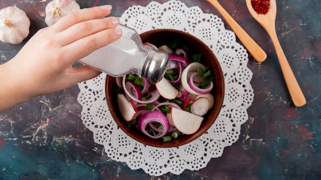 People with high blood pressure need to stop using salt shakers but the solution requires more