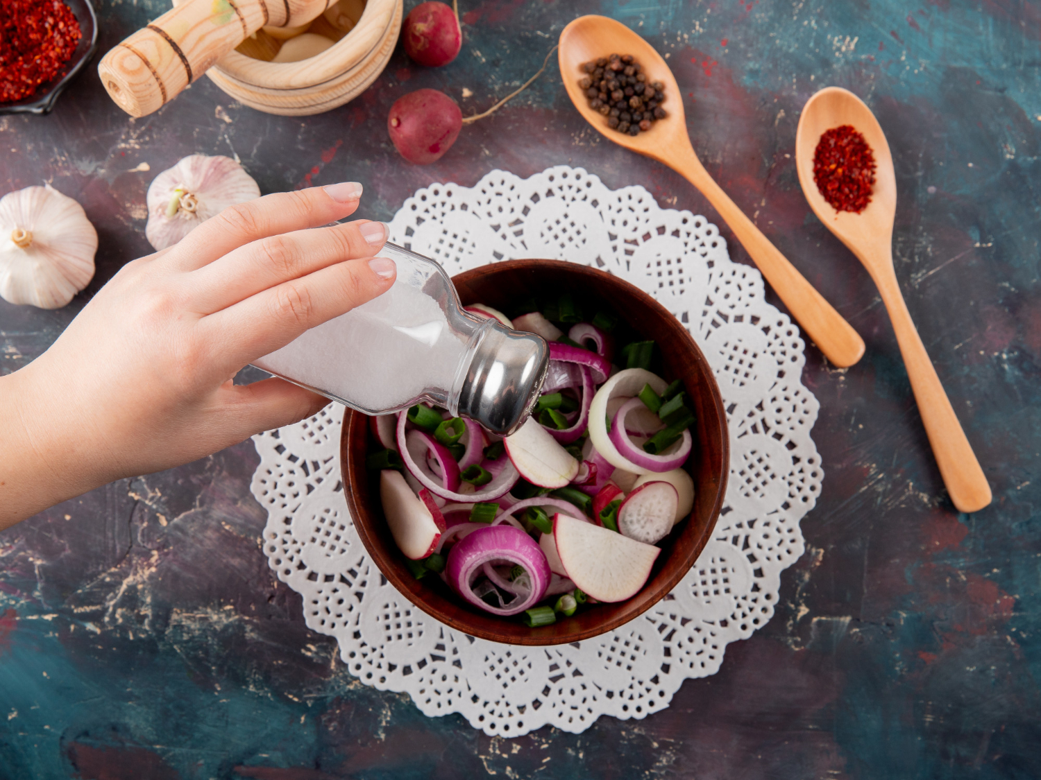 People with high blood pressure need to stop using salt shakers but the solution requires more