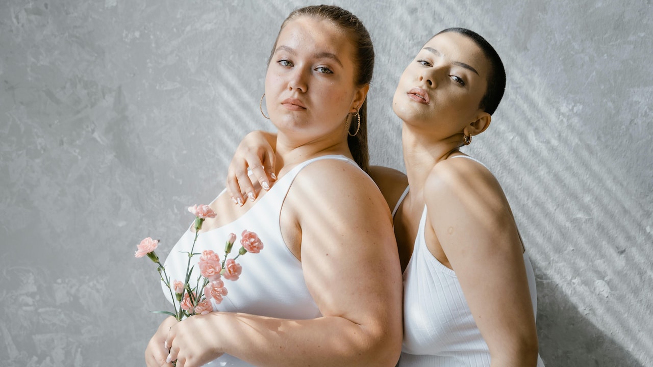 Discover expert tips to make tank tops look flattering on broad shoulders.