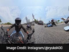 Biker Gets Into Accident, Stands Up Unscathed, Gives Thumbs-Up To Car Driver